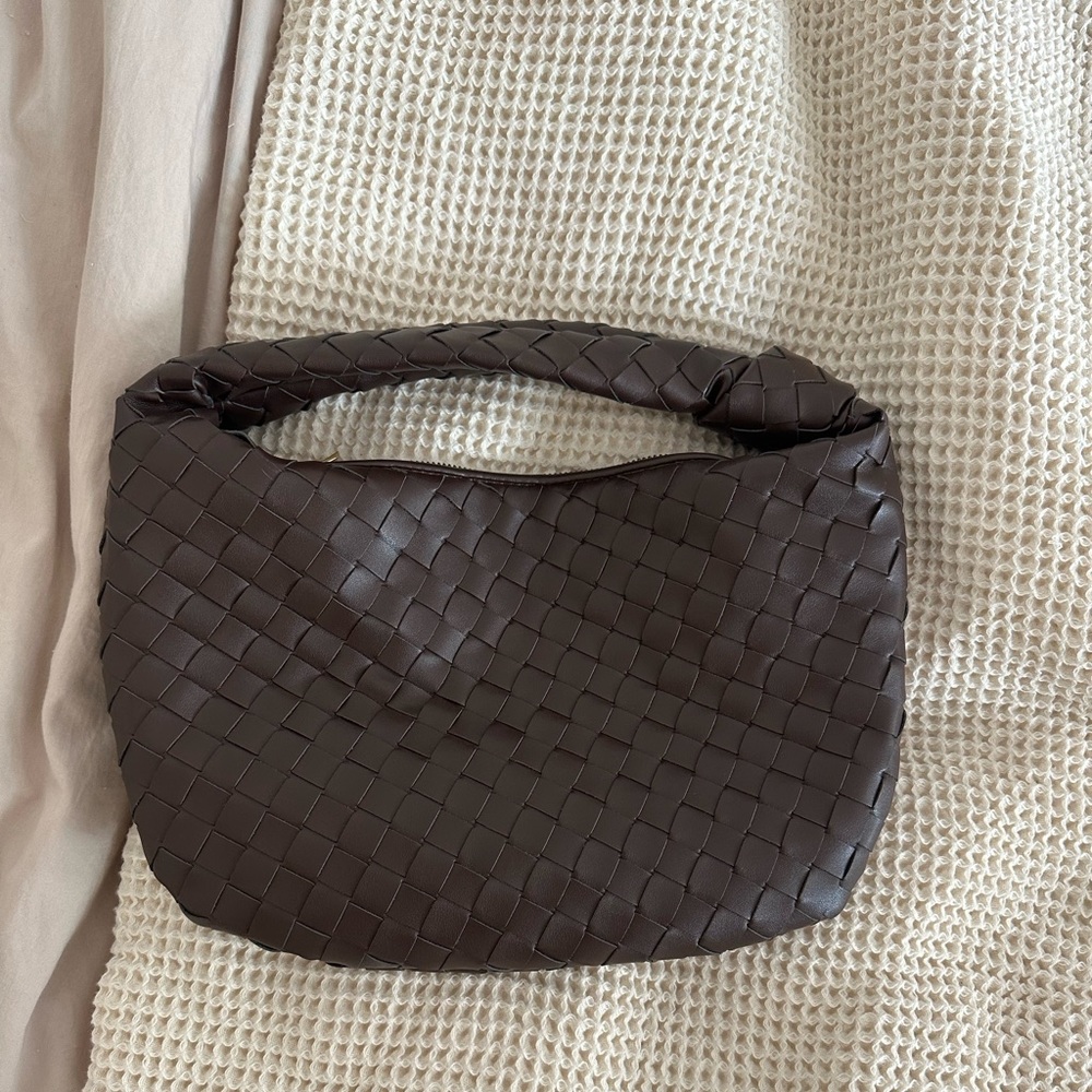 Brown woven leather knot bag